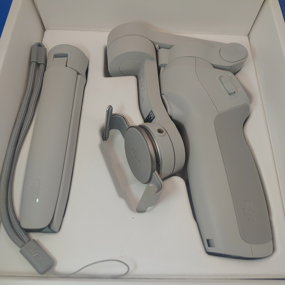 DJI OM 4 SmartPhone Gimble 3 Axis Stabilizer New Open Box Fully Tested